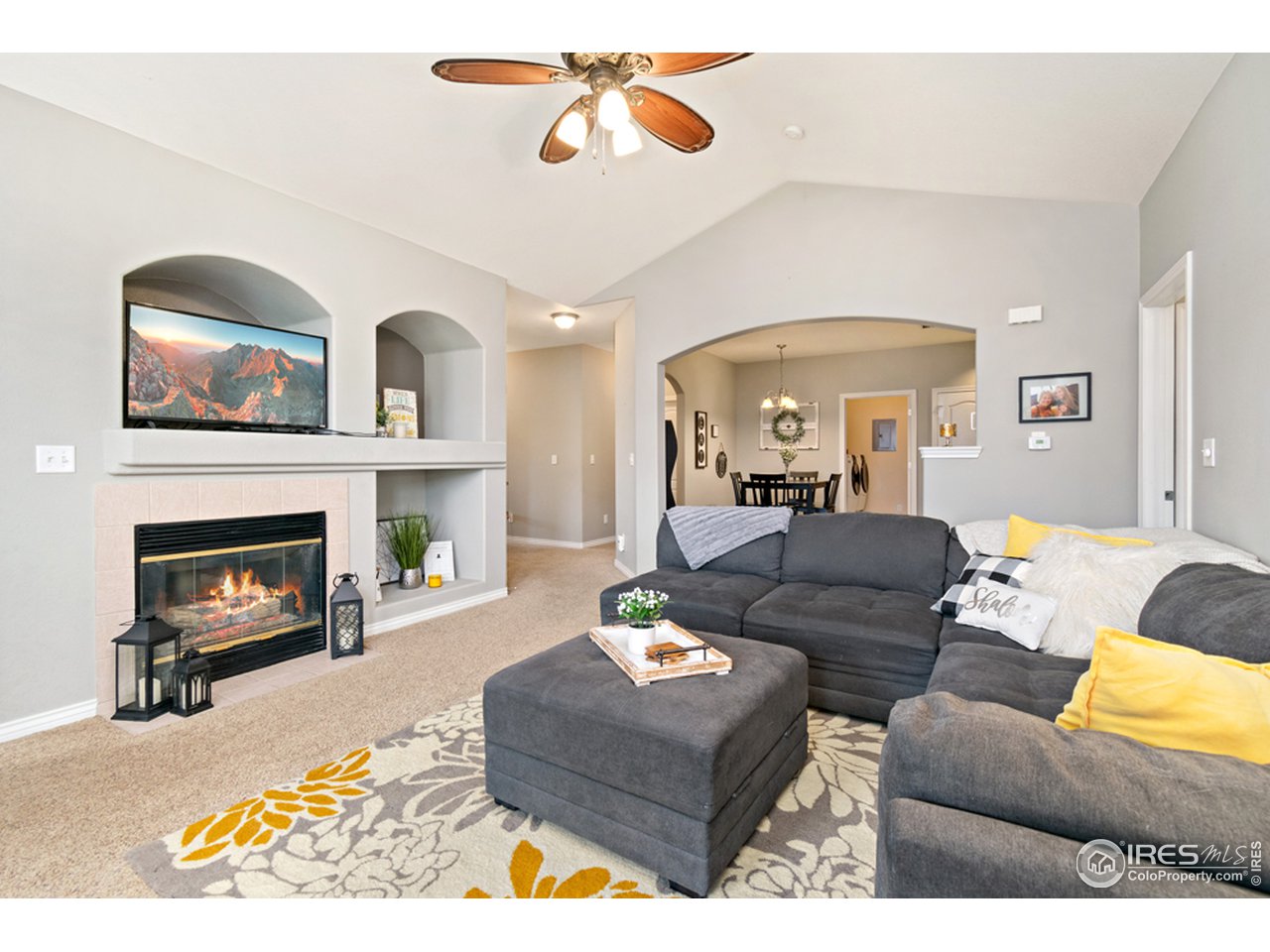 4672 West 20th Road, Unit 2123 Greeley, CO 80634 - Photo 5 of 25 Gas Fireplace & vaulted ceilings