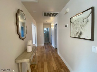 2712 Rialto Road Las Vegas, NV 89108 - Photo 48 of 54 Corridor featuring wood finished floors and baseboards