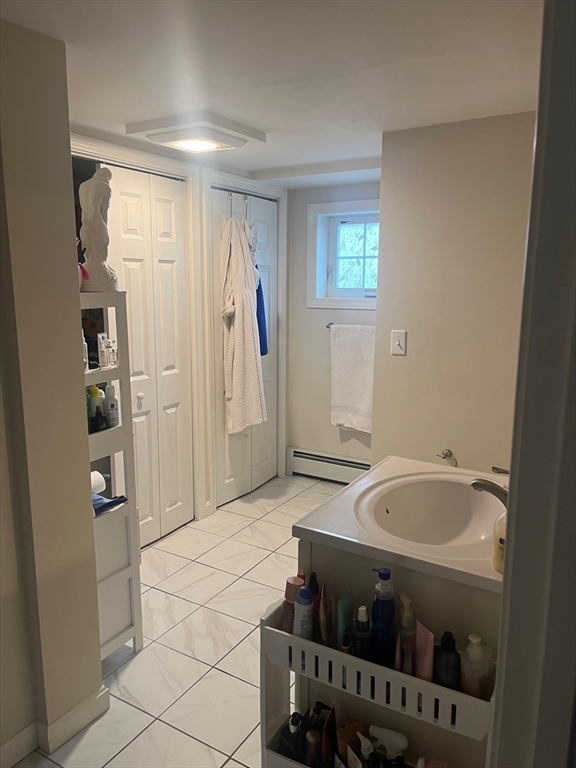 41 Jean Street Acushnet, MA 02743 - Photo 17 of 21 a bathroom with a tub a sink and a shower