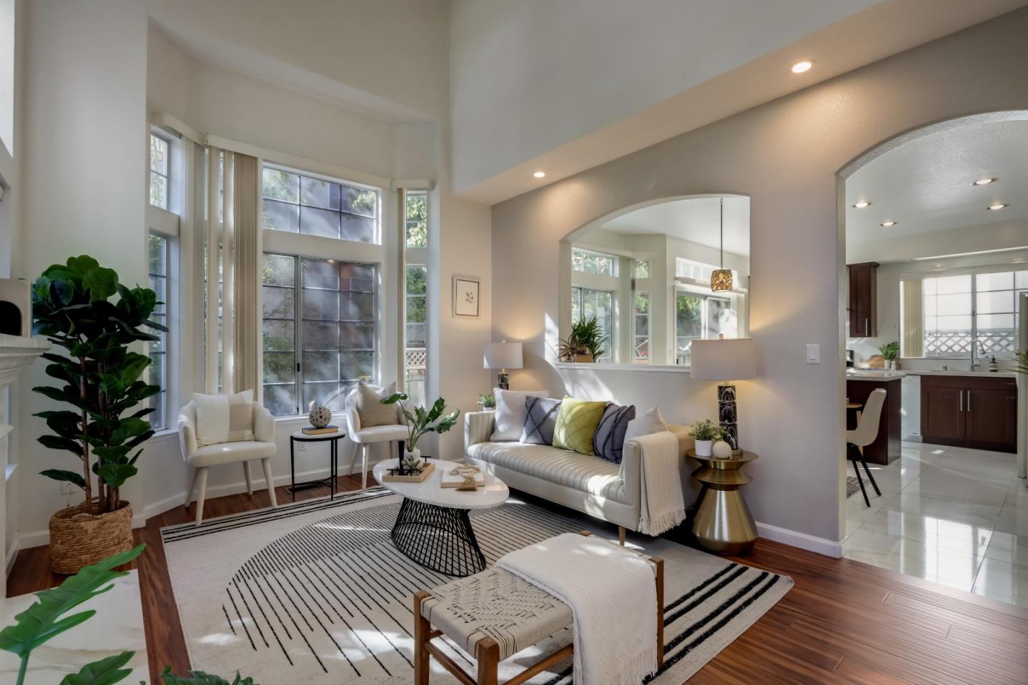 2373 Homestead Road Santa Clara, CA 95050 - Photo 1 of 30 a living room with furniture and a potted plant