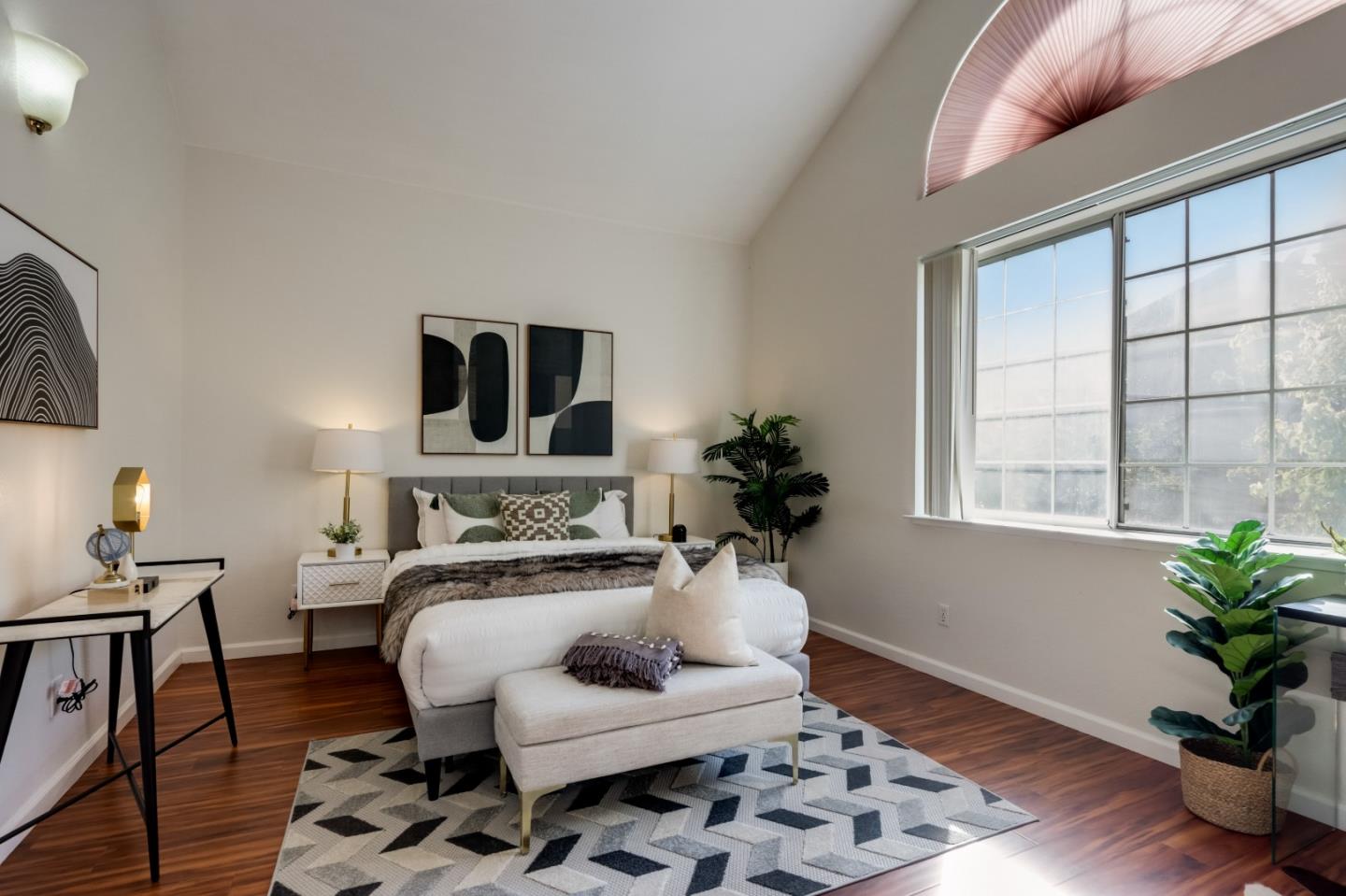 2373 Homestead Road Santa Clara, CA 95050 - Photo 13 of 30 a bedroom with a bed and wooden floor