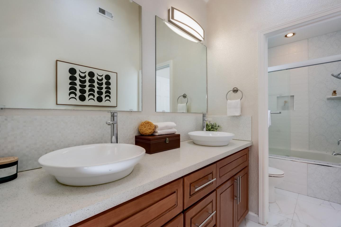 2373 Homestead Road Santa Clara, CA 95050 - Photo 15 of 30 a bathroom with a sink a toilet and shower