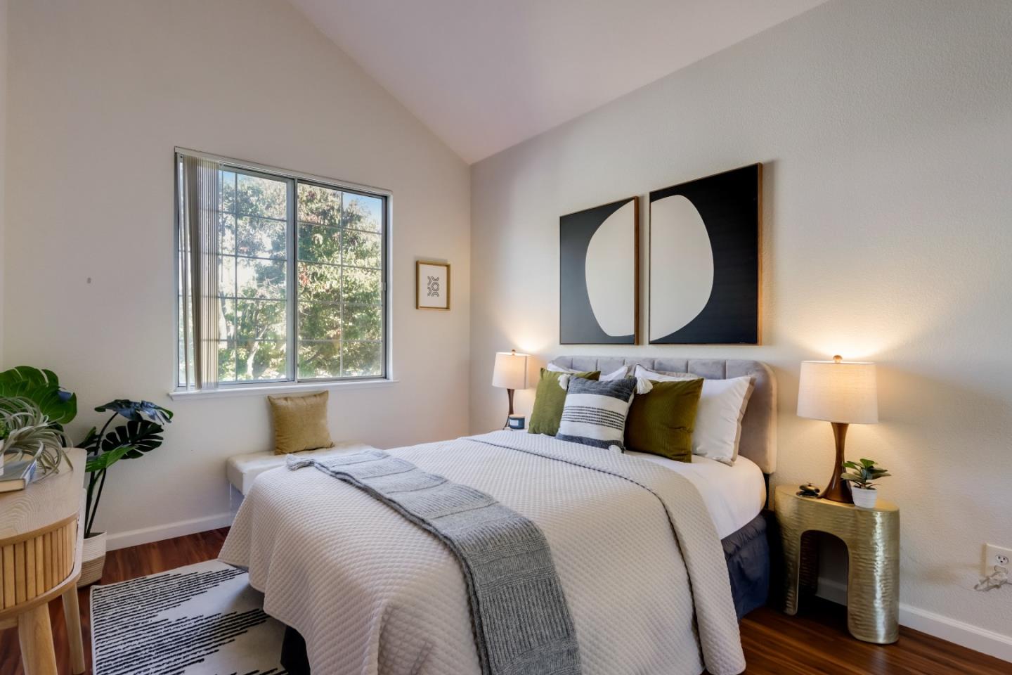 2373 Homestead Road Santa Clara, CA 95050 - Photo 16 of 30 a bedroom with a large bed and a window