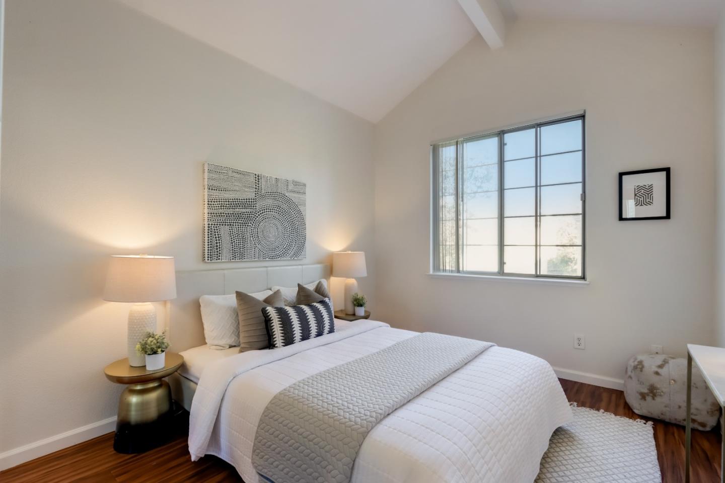 2373 Homestead Road Santa Clara, CA 95050 - Photo 18 of 30 a bedroom with a bed and a window