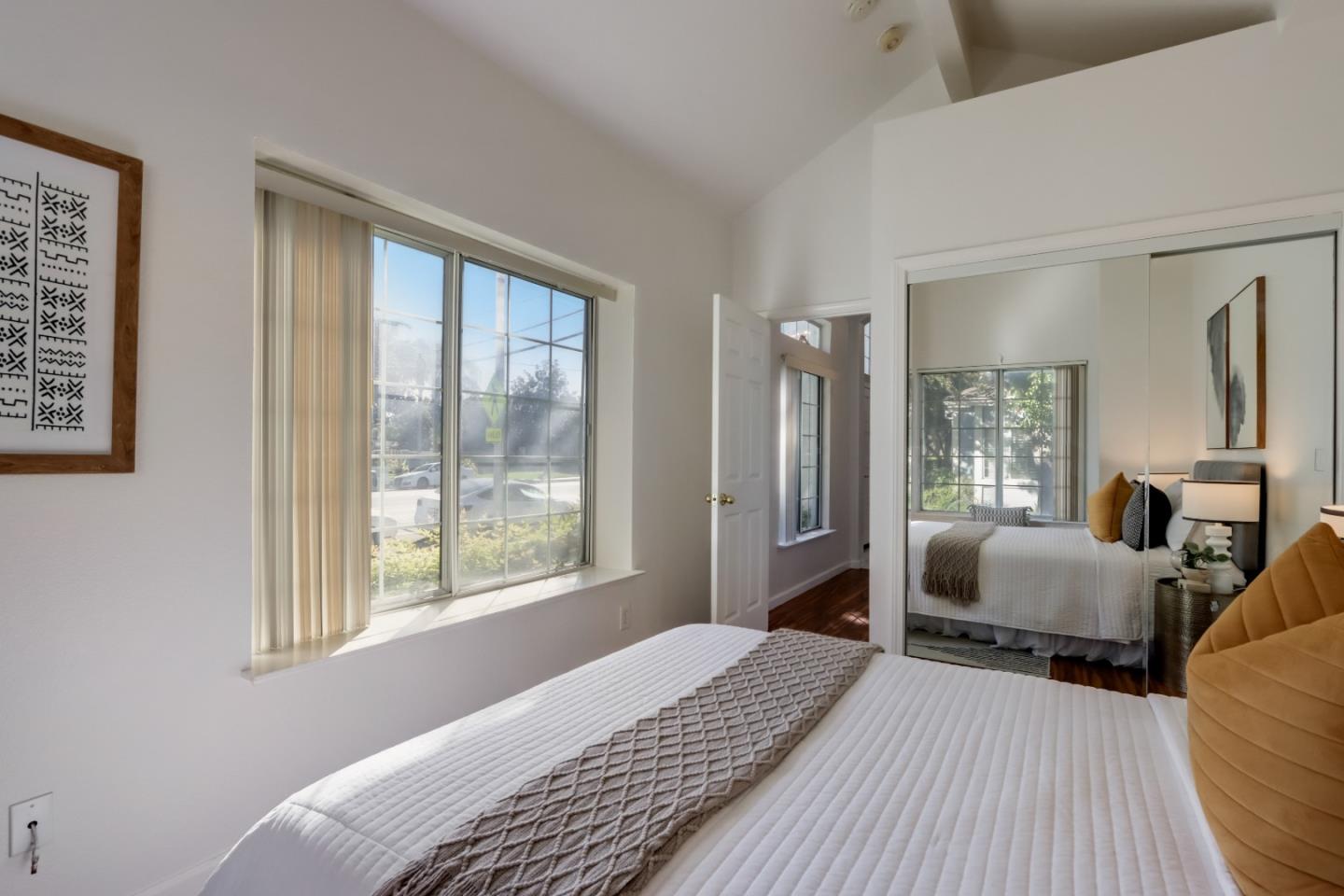 2373 Homestead Road Santa Clara, CA 95050 - Photo 22 of 30 a bedroom with bed and large window