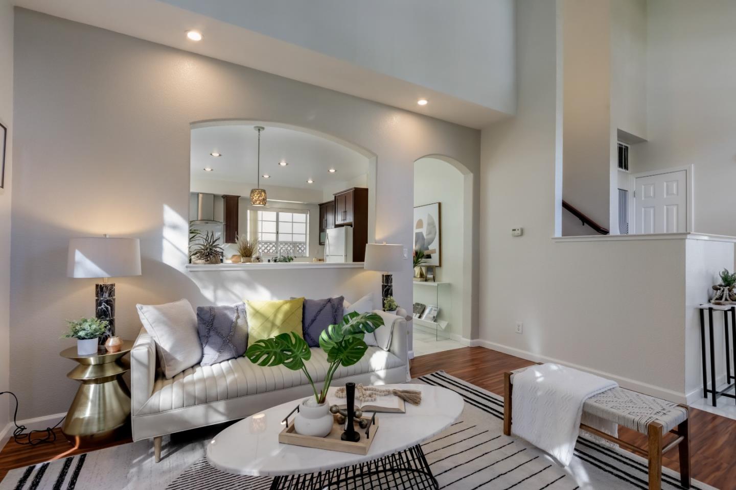 2373 Homestead Road Santa Clara, CA 95050 - Photo 3 of 30 a living room with furniture and a chandelier