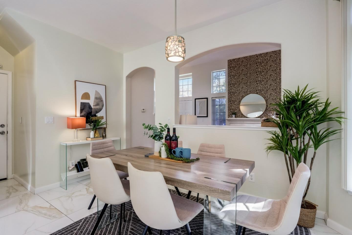 2373 Homestead Road Santa Clara, CA 95050 - Photo 7 of 30 a view of a dining room with furniture and a chandelier