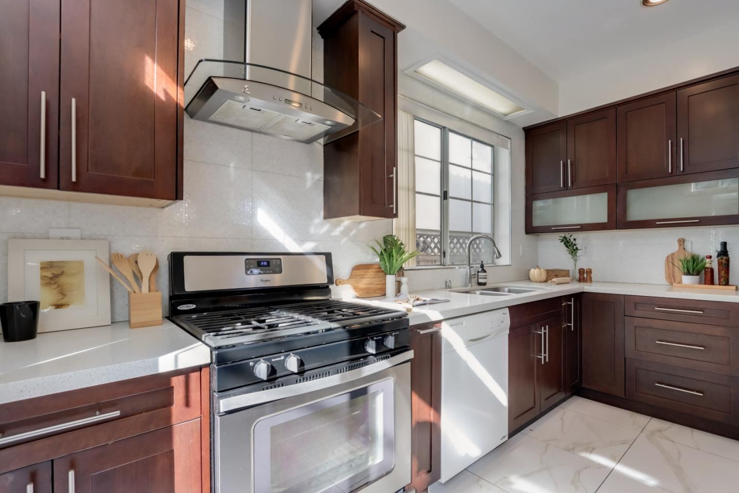 2373 Homestead Road Santa Clara, CA 95050 - Photo 10 of 30 a kitchen with cabinets appliances and a window