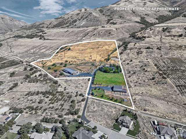 165 East 1550th South Perry, UT 84302 - Photo 2 of 26 Birds eye view of property with a mountain view