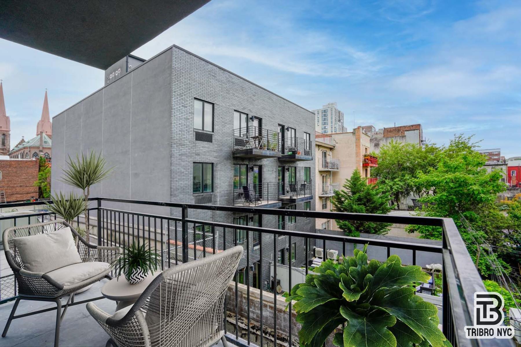 92 Manhattan Avenue, Unit 1B Brooklyn, NY 11206 - Photo 7 of 9 a view of a balcony with furniture