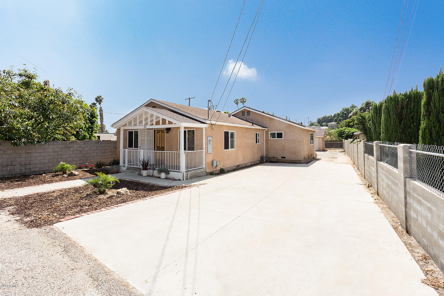 931 Walnut Canyon Road Moorpark, CA 93021 - Photo 2 of 27 a front view of a house with a yard