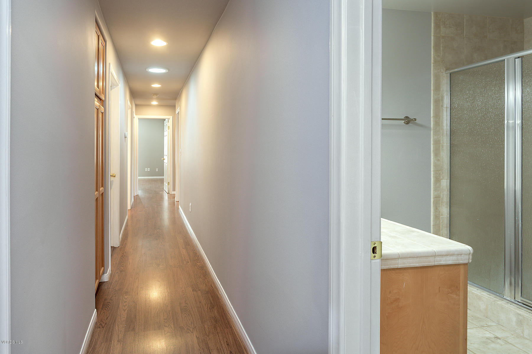 931 Walnut Canyon Road Moorpark, CA 93021 - Photo 16 of 27 a view of hallway with wooden floor