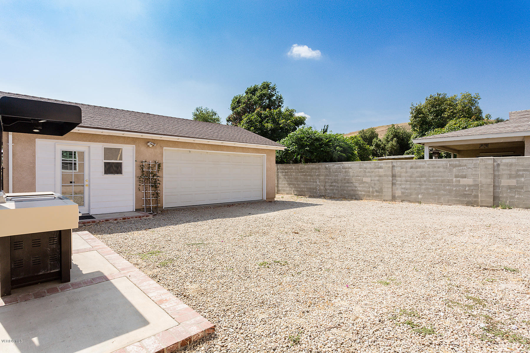 931 Walnut Canyon Road Moorpark, CA 93021 - Photo 24 of 27 a view of a backyard of the house