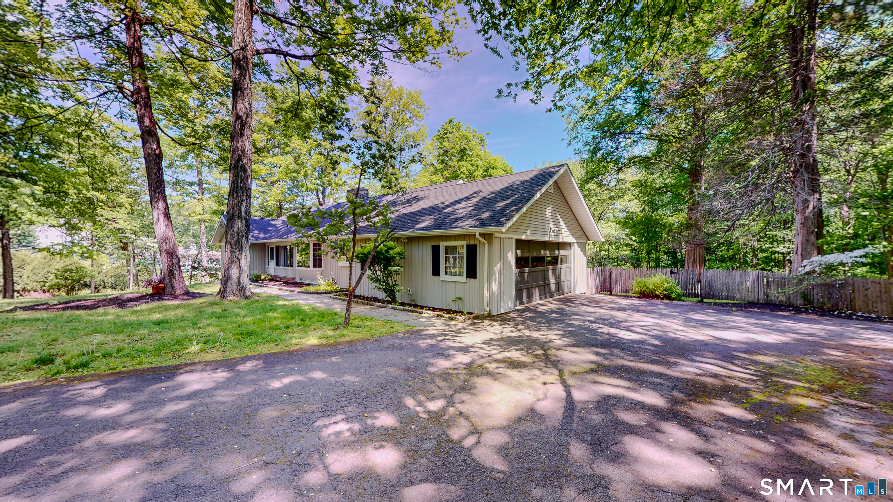 133 Chambers Road Danbury, CT 06811 - Photo 2 of 30 a view of a house with a yard and large tree