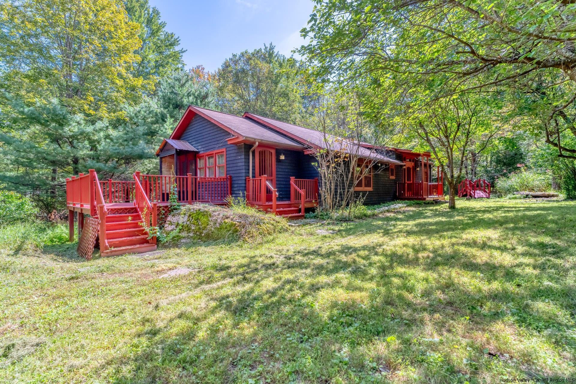 344 Scarawan Road Stone Ridge, NY 12484 - Photo 1 of 30 a view of a house with a yard porch and tree
