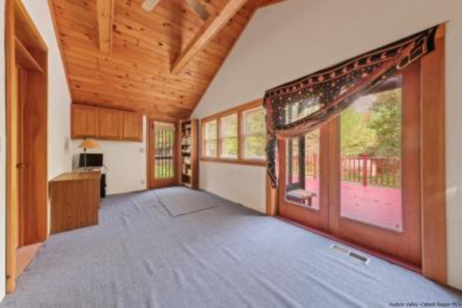 344 Scarawan Road Stone Ridge, NY 12484 - Photo 20 of 30 a view of an empty room with a window
