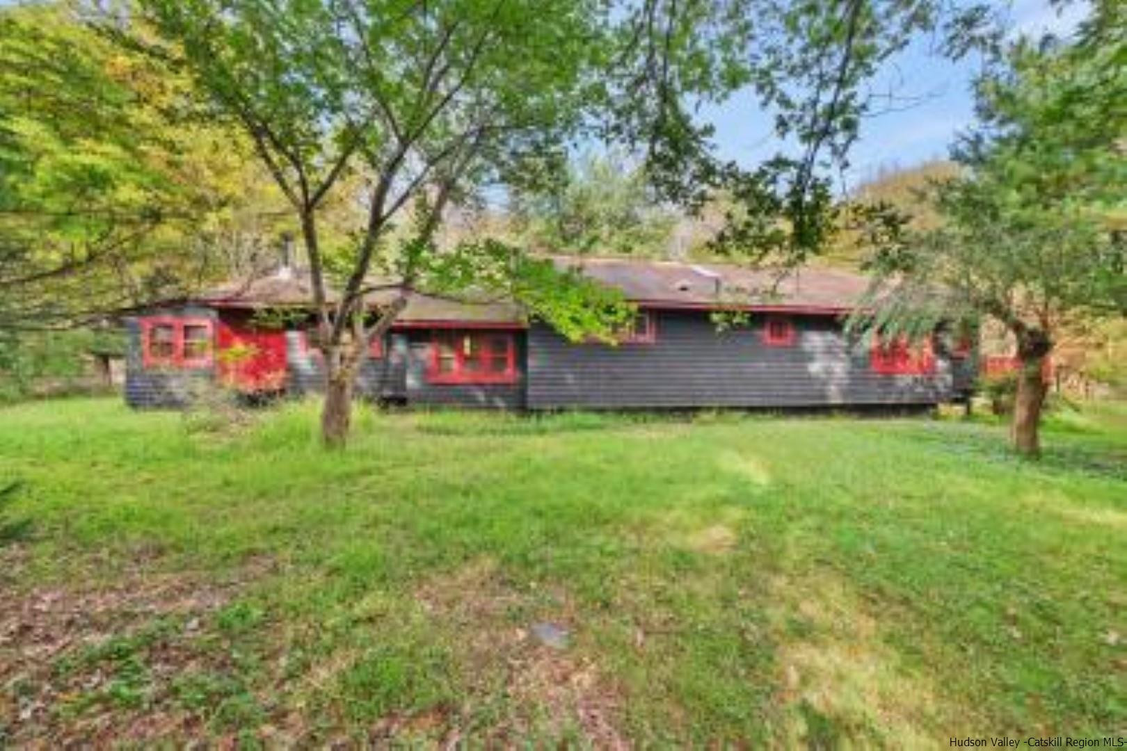 344 Scarawan Road Stone Ridge, NY 12484 - Photo 24 of 30 a front view of a house with garden
