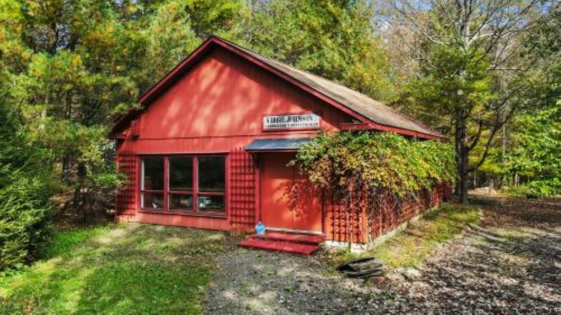 344 Scarawan Road Stone Ridge, NY 12484 - Photo 26 of 30 a front view of a house with garden