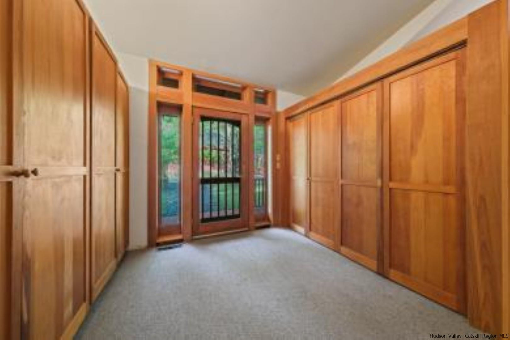 344 Scarawan Road Stone Ridge, NY 12484 - Photo 4 of 30 a view of an empty room with a window