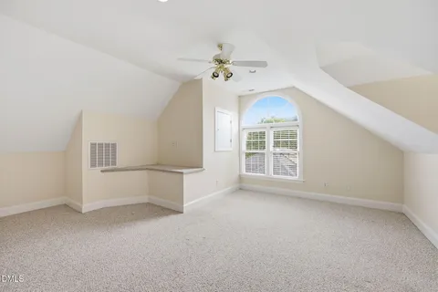 a view of a house with a yard porch and sitting area