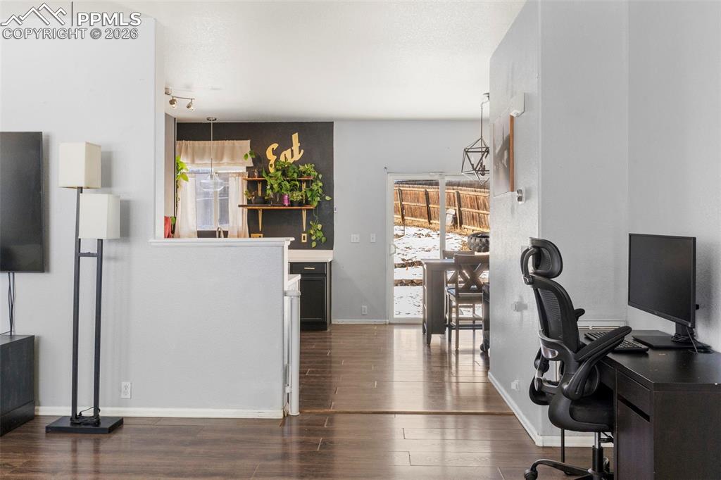 7509 Sistine Lane Fountain, CO 80817 - Photo 3 of 22 a view of a kitchen with refrigerator and workspace
