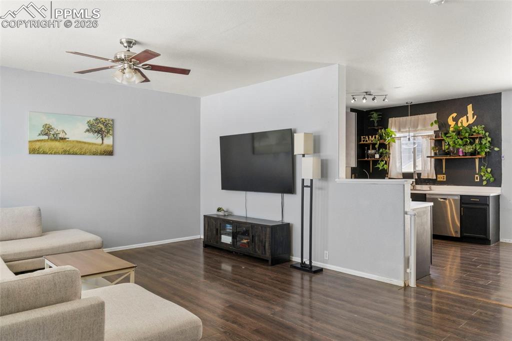 7509 Sistine Lane Fountain, CO 80817 - Photo 4 of 22 a living room with furniture and a flat screen tv