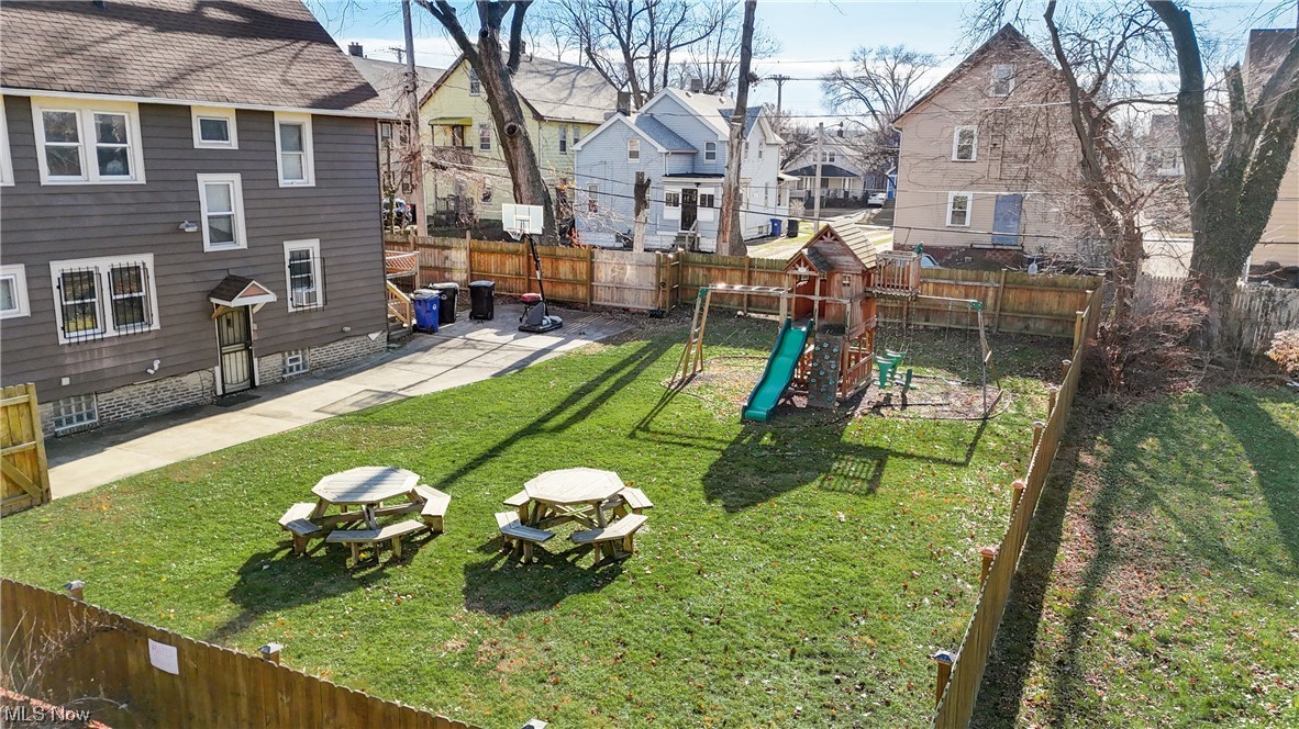 14202 Glenside Road Cleveland, OH 44110 - Photo 38 of 41 View of yard featuring a playground