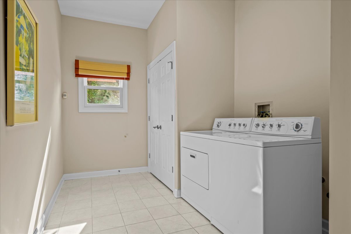 738 Lyster Road Highwood, IL 60040 - Photo 11 of 16 a utility room with dryer and washer