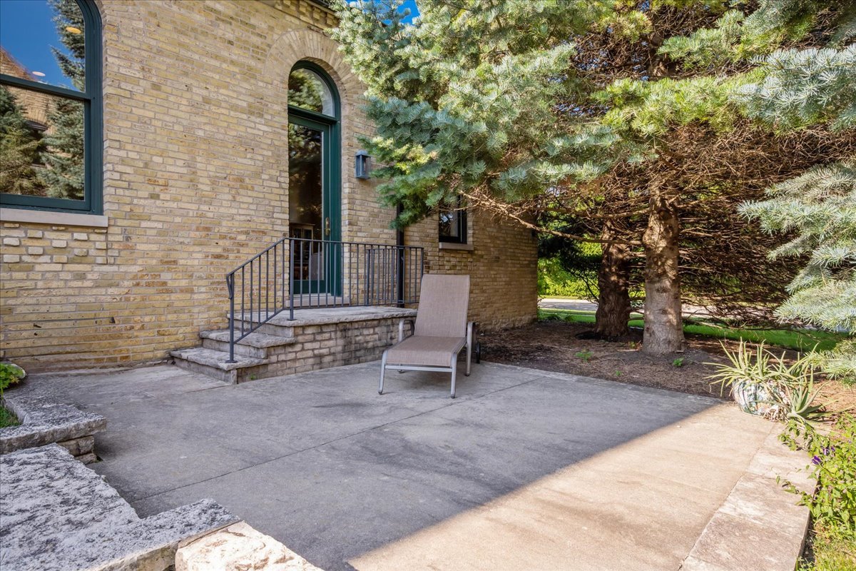 738 Lyster Road Highwood, IL 60040 - Photo 13 of 16 a bench is sitting in middle of a yard