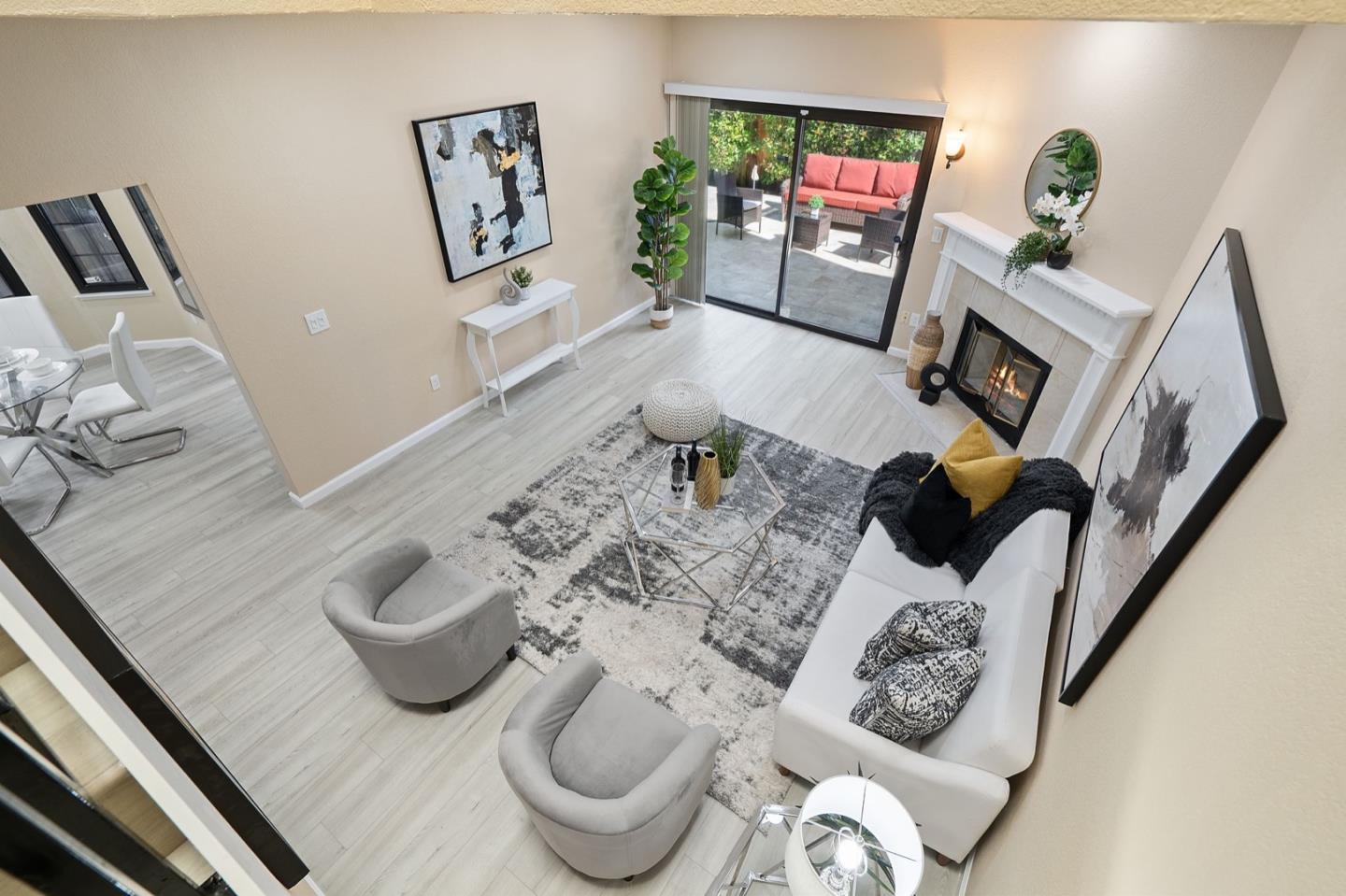 229 Michigan Road Milpitas, CA 95035 - Photo 14 of 38 a living room with furniture and a flat screen tv
