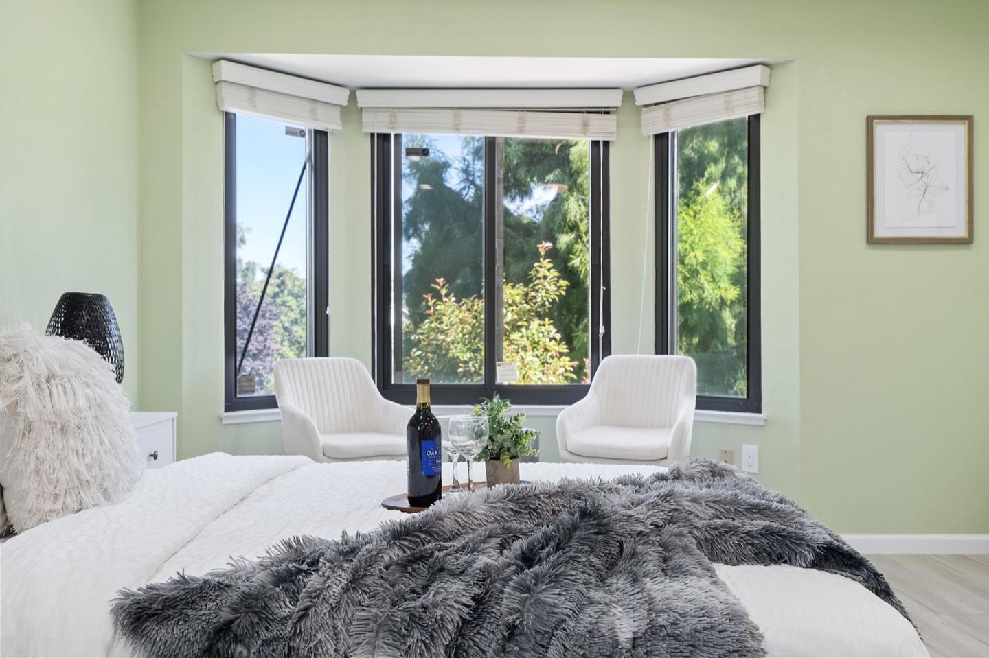 229 Michigan Road Milpitas, CA 95035 - Photo 23 of 38 a bedroom with a bed and a large window
