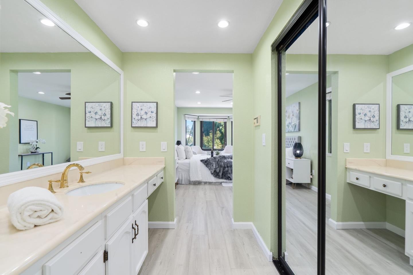 229 Michigan Road Milpitas, CA 95035 - Photo 27 of 38 a spacious bathroom with a double vanity sink a mirror and a shower
