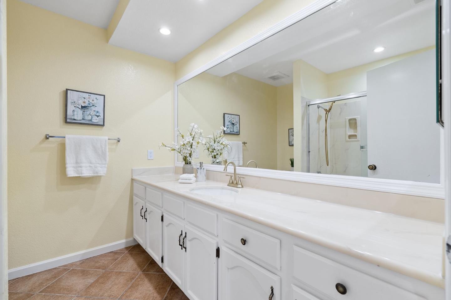 229 Michigan Road Milpitas, CA 95035 - Photo 31 of 38 a spacious bathroom with a double vanity sink and a mirror