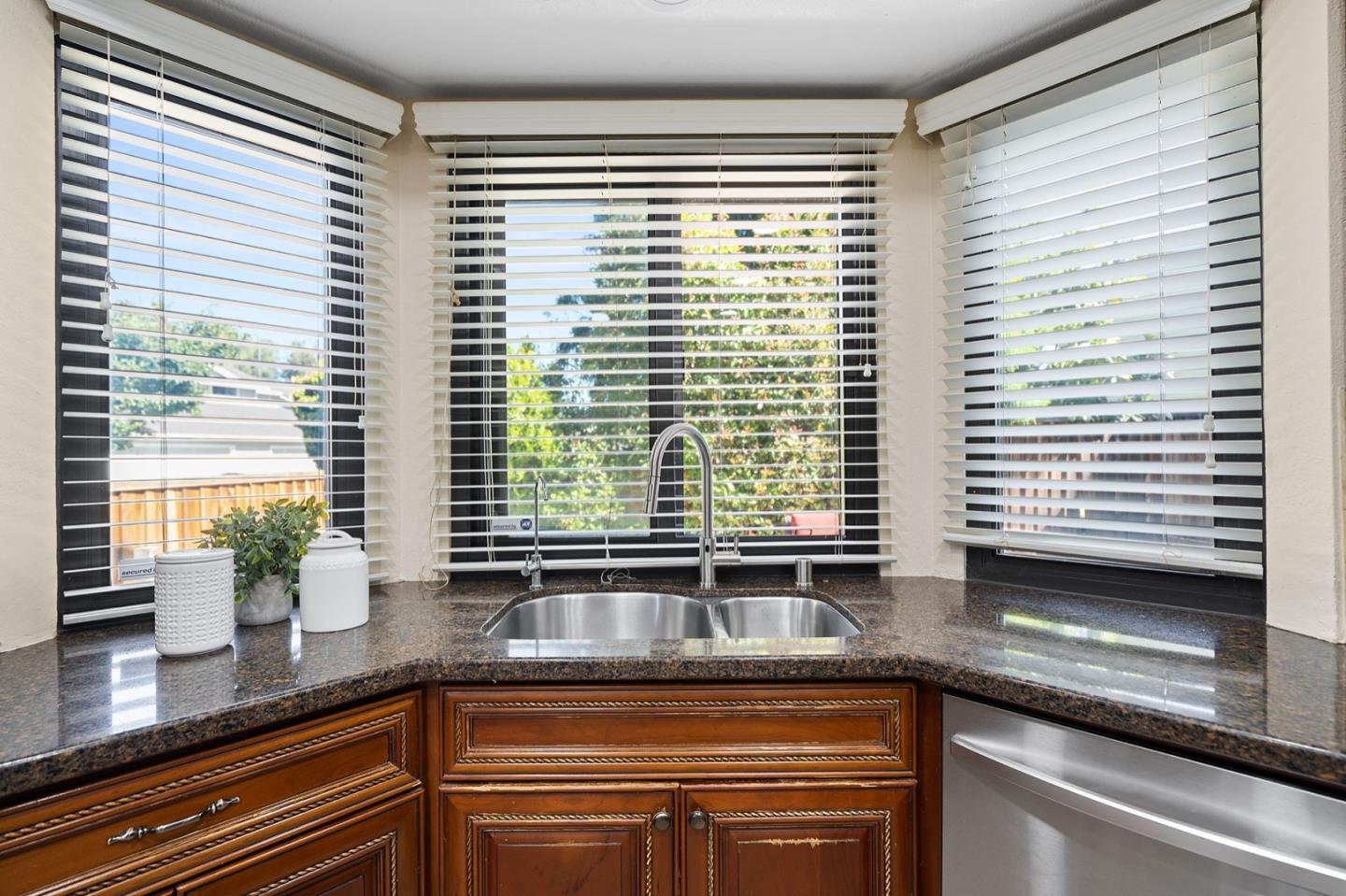 229 Michigan Road Milpitas, CA 95035 - Photo 8 of 38 a kitchen with a sink and large window