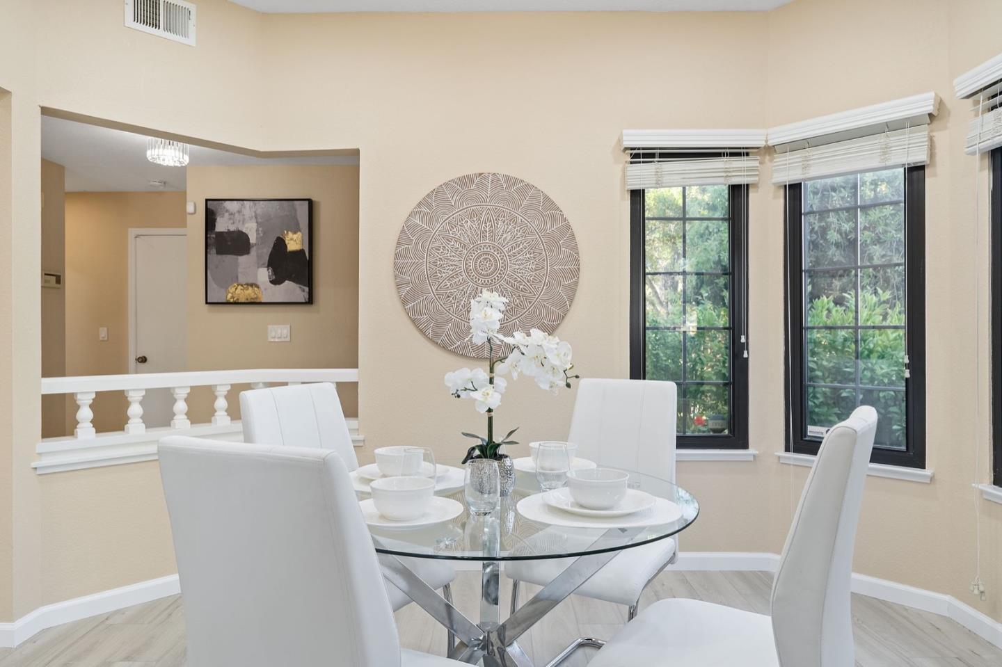 229 Michigan Road Milpitas, CA 95035 - Photo 10 of 38 a dining room with furniture and wooden floor