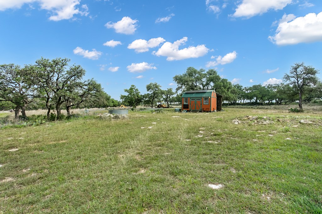 181 Real Lake House Road South Kerrville, TX 78028 - Photo 4 of 18 a view of a lake with a yard