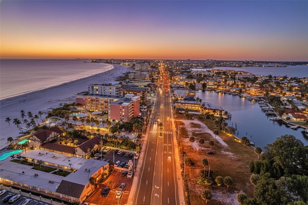 2064 Sunset Point Road, Unit 73 Clearwater, FL 33765 - Photo 58 of 58 an aerial view of residential houses with outdoor space