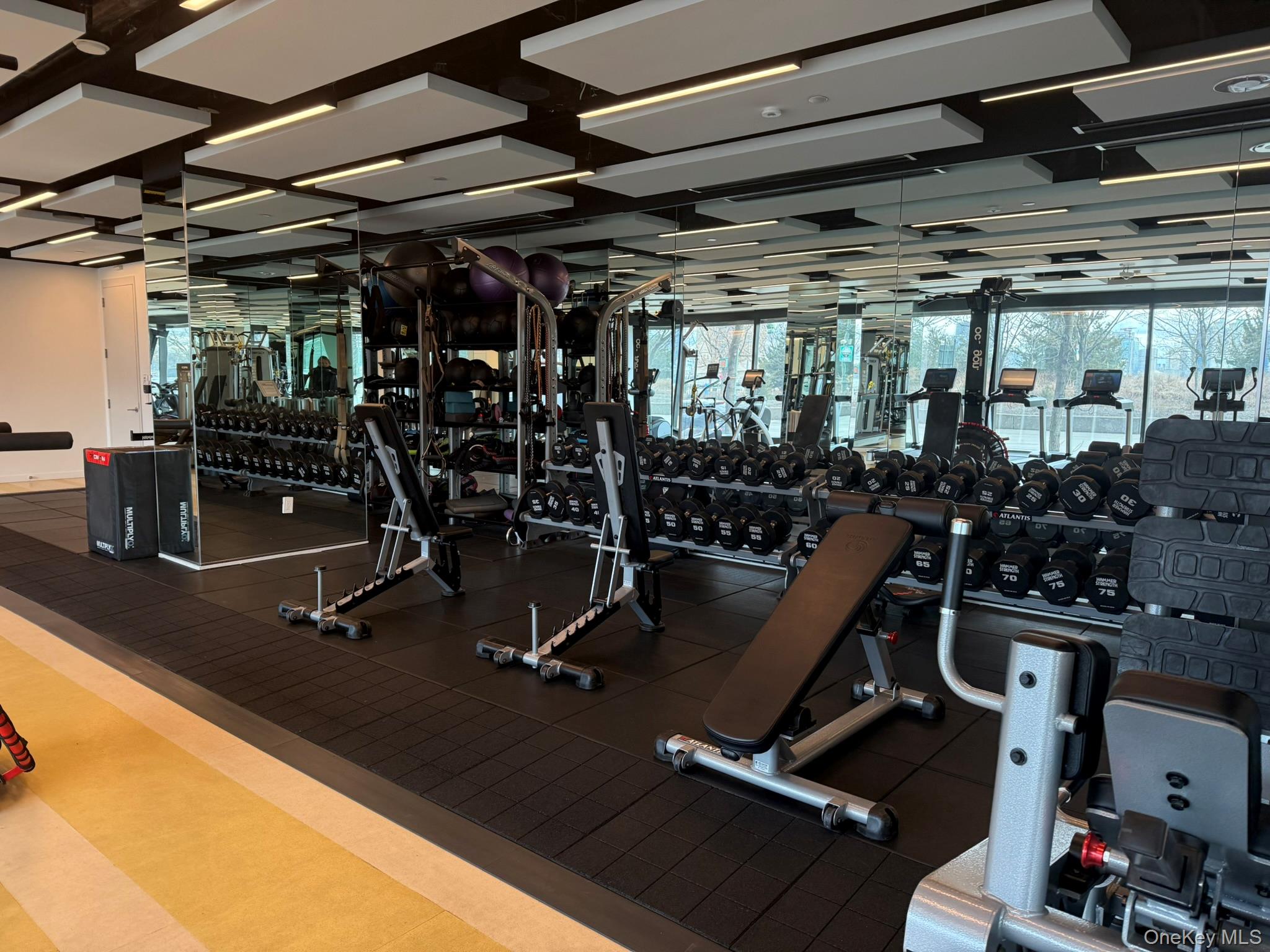 450 Washington Street, Unit 306 Manhattan, NY 10013 - Photo 12 of 33 a view of a room with gym equipment