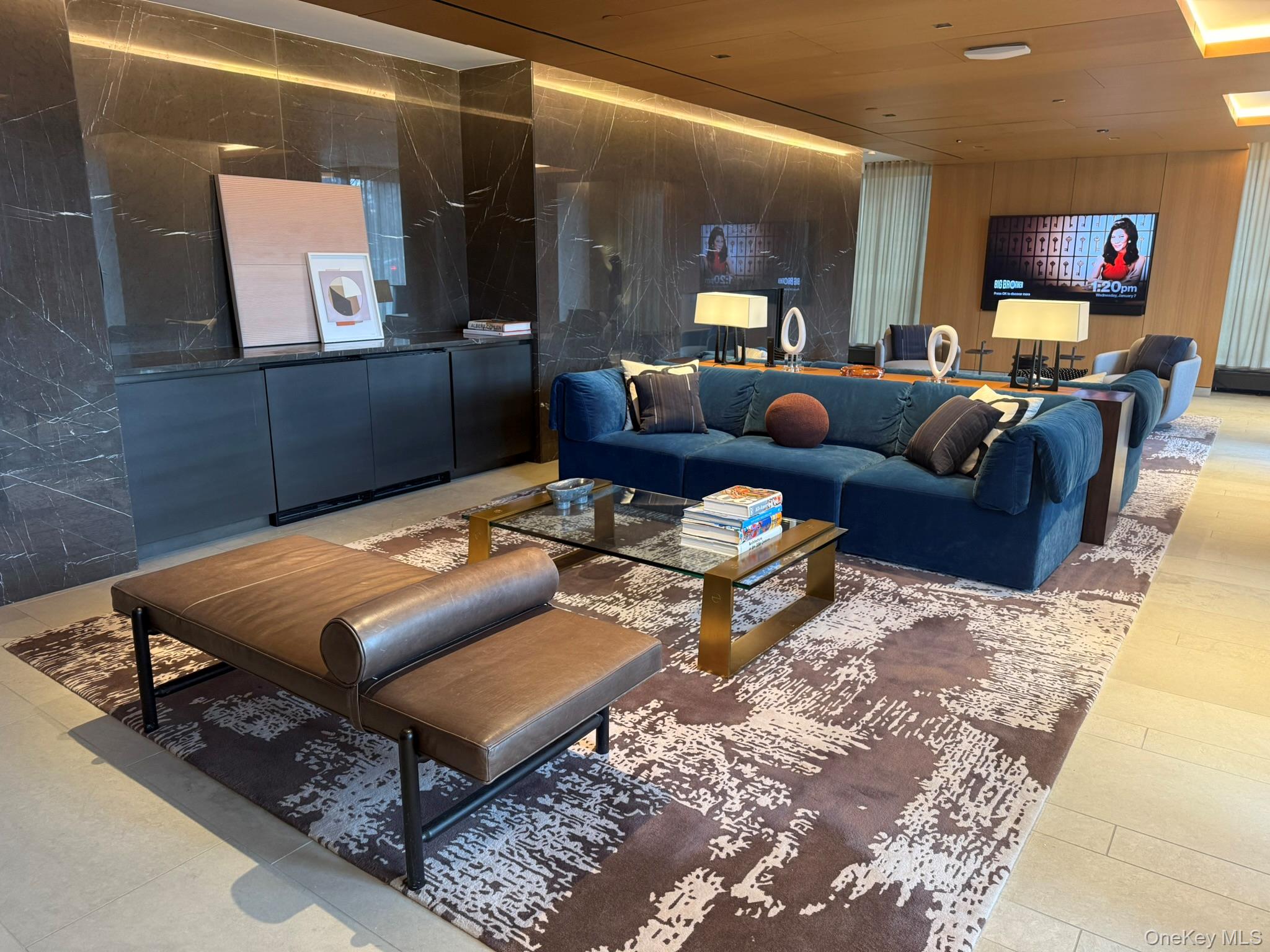 450 Washington Street, Unit 306 Manhattan, NY 10013 - Photo 14 of 33 a living room with furniture and a flat screen tv