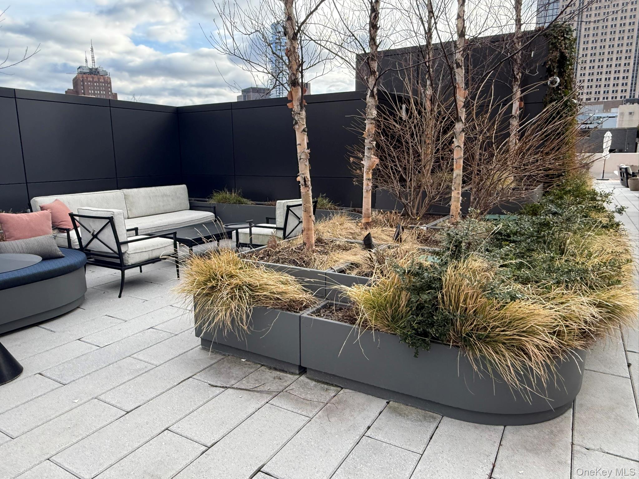 450 Washington Street, Unit 306 Manhattan, NY 10013 - Photo 19 of 33 a terrace of a house with outdoor seating