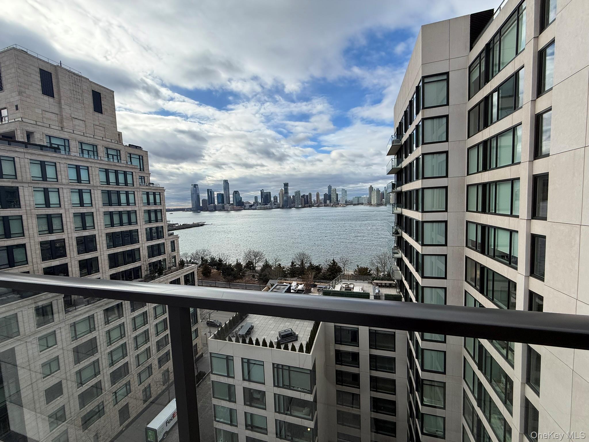450 Washington Street, Unit 306 Manhattan, NY 10013 - Photo 23 of 33 a front view of a building with glass windows