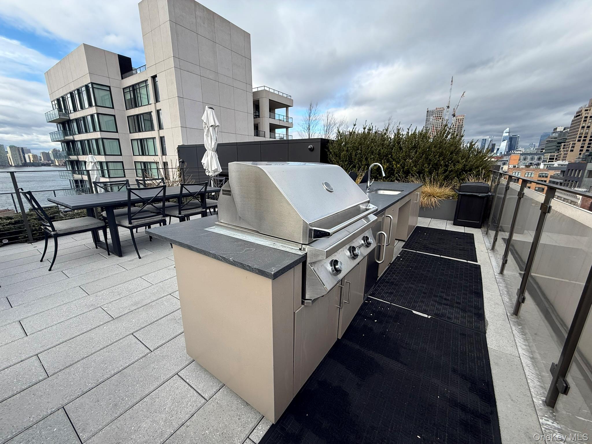 450 Washington Street, Unit 306 Manhattan, NY 10013 - Photo 26 of 33 a terrace with seating area and barbeque oven