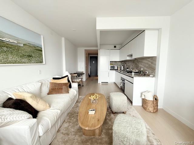 450 Washington Street, Unit 306 Manhattan, NY 10013 - Photo 3 of 33 a living room with furniture and a fireplace