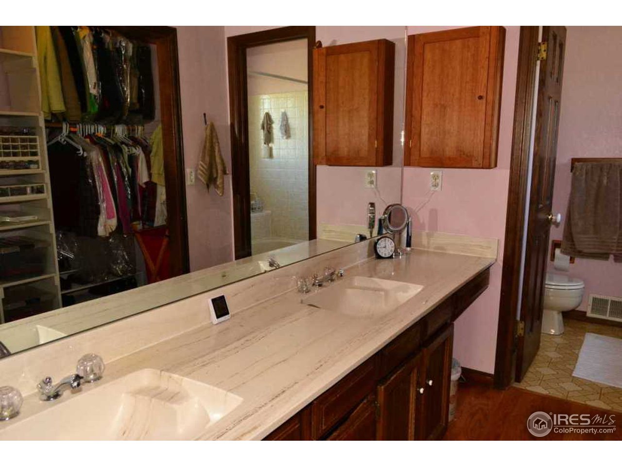 10107 Phillips Road Lafayette, CO 80026 - Photo 14 of 22 a bathroom with a sink and a mirror