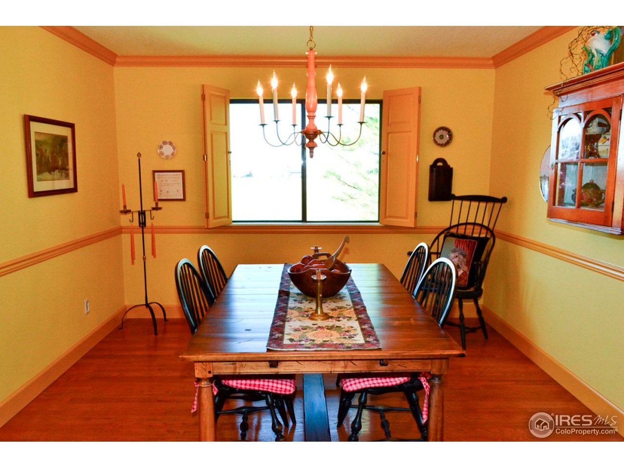 10107 Phillips Road Lafayette, CO 80026 - Photo 7 of 22 a view of a dining room with furniture and window