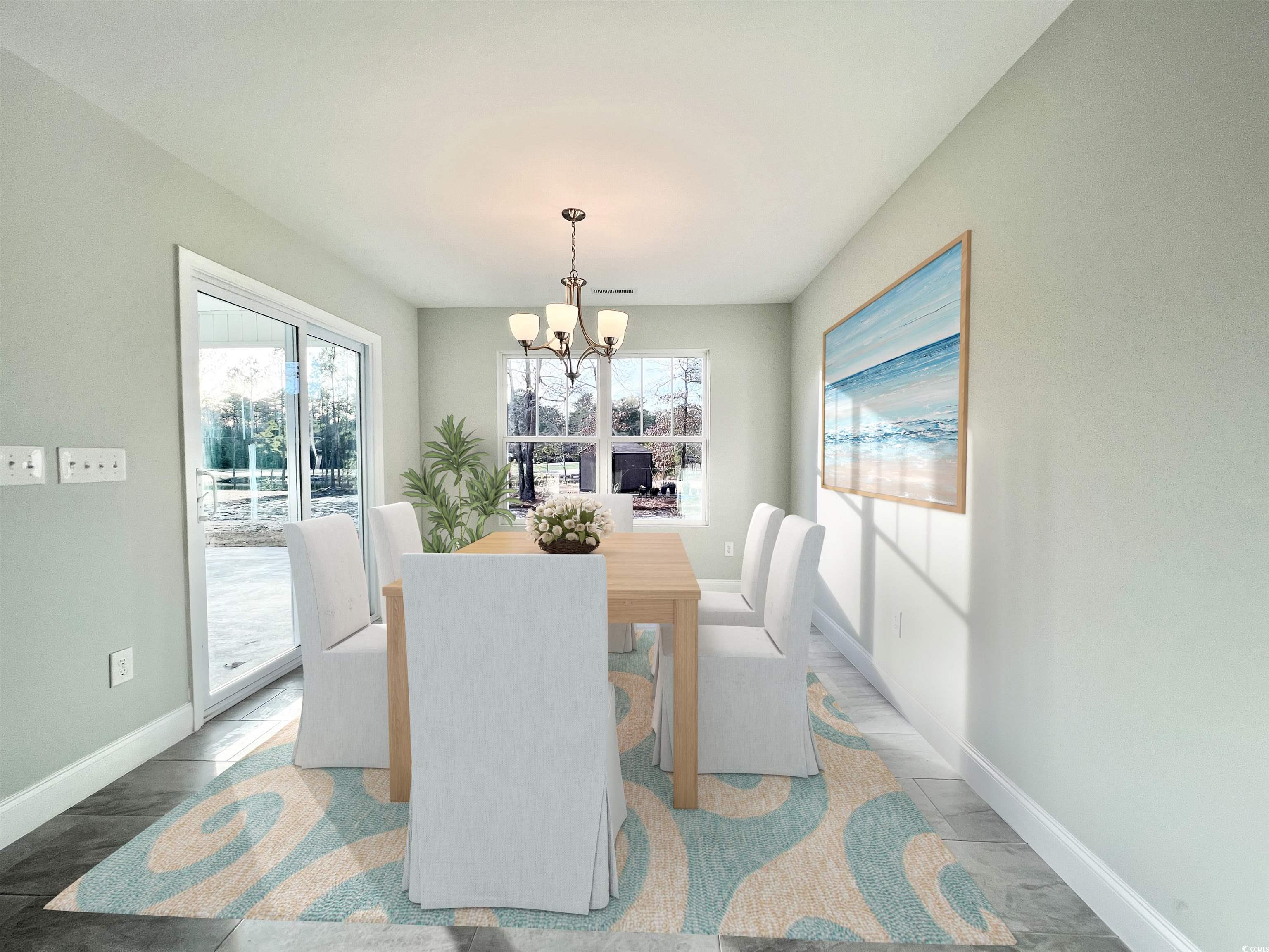 1424 Nathan Drive Loris, SC 29569 - Photo 4 of 30 Dining area featuring a notable chandelier and ple