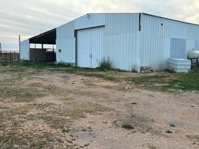 1014 Old Lamesa Road Brownfield, TX 79316 - Photo 3 of 13 a view of a backyard
