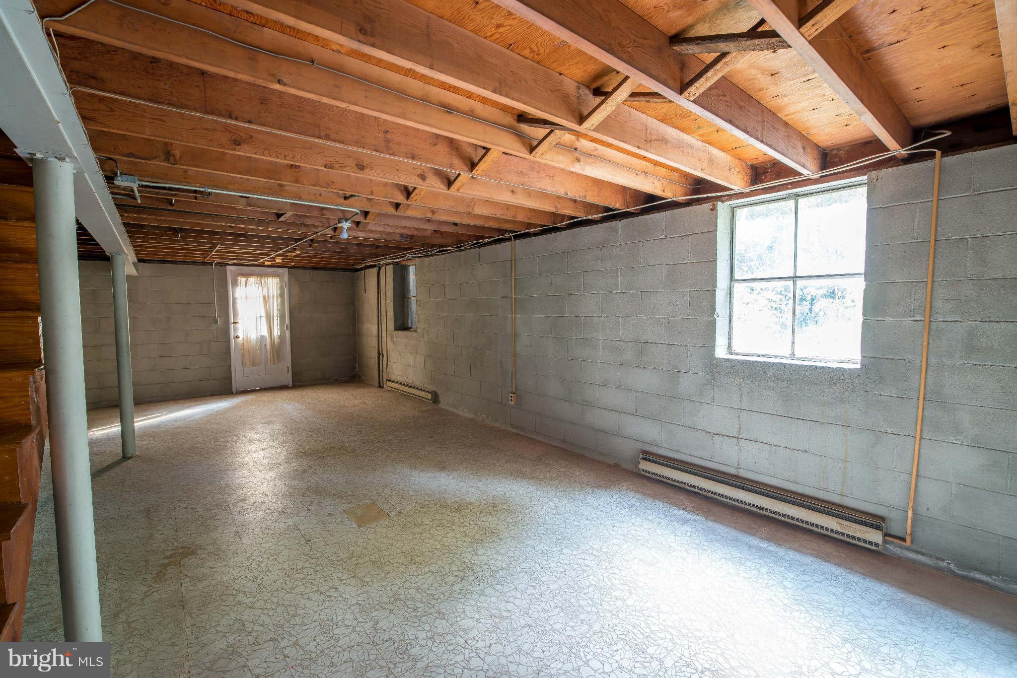 5 Beechdale Road Baltimore, MD 21210 - Photo 18 of 20 a view of empty room with windows