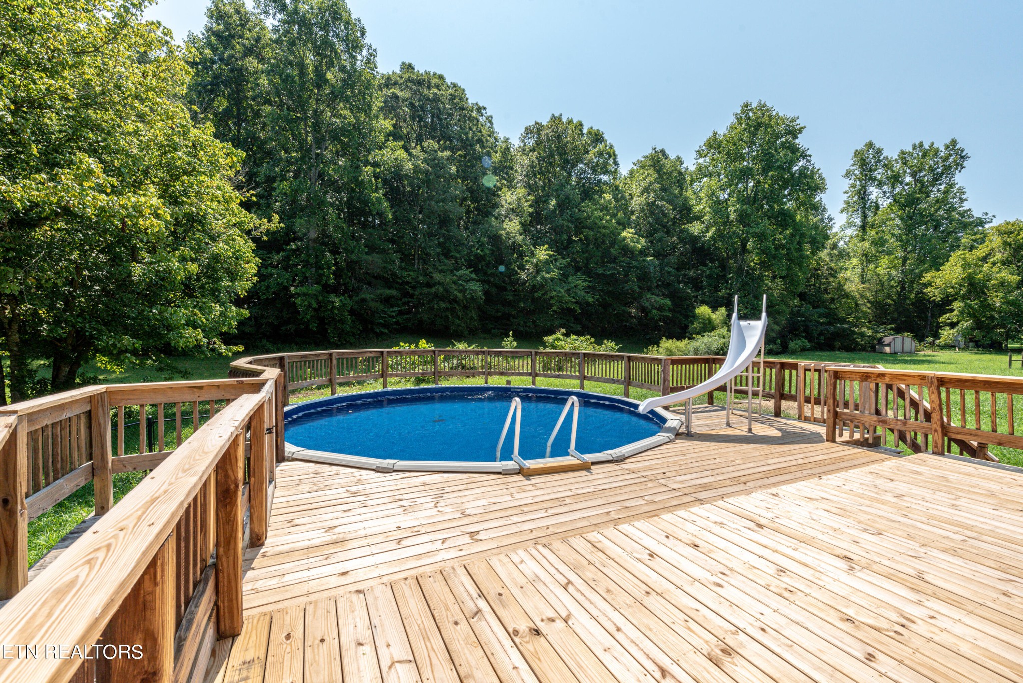 135 Crowder Road Madisonville, TN 37354 - Photo 3 of 39 a view of a swimming pool with a patio