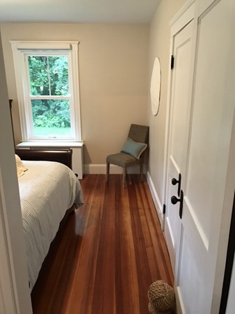 44 Prospect Street Acton, MA 01720 - Photo 12 of 25 a bed room with a bed and a window